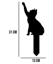 Eine Gedenktafel für das Grab einer Katze. Eine personalisierte Kerze zum Gedenken an einen Schüler.